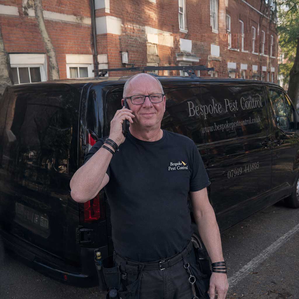 Bespoke pest control discussing a clients pest issues on the phone